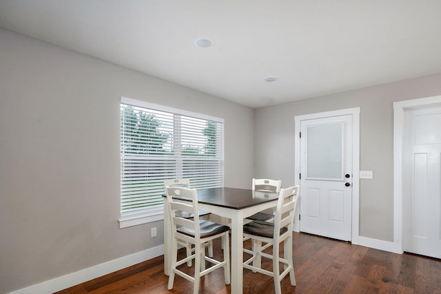 917 W Charlotte St, Republic, MO 65738 - dining room featuring baseboards and dark wood finished floors