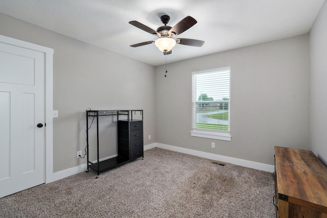 917 W Charlotte St, Republic, MO 65738 - unfurnished bedroom featuring carpet and ceiling fan