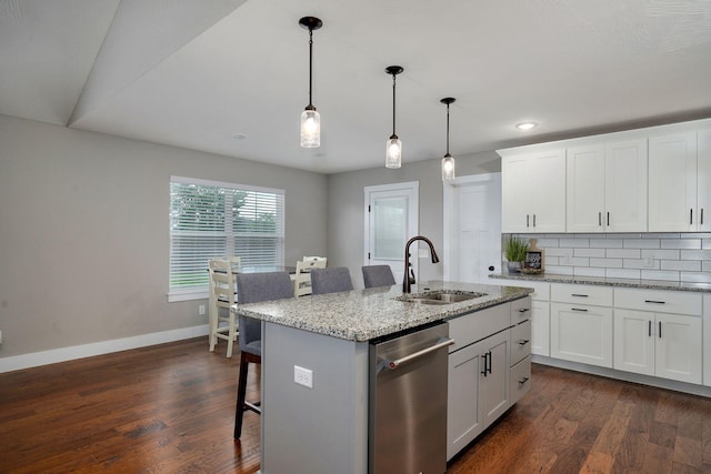 917 W Charlotte St, Republic, MO 65738 - kitchen featuring dishwasher, a kitchen bar, dark wood-type flooring, a kitchen island with sink, and recessed lighting
