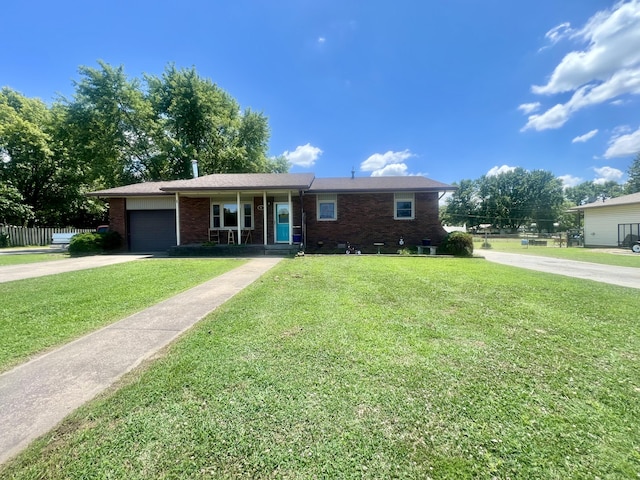 817 Fillmore St, Mount Vernon, MO 65712 - ranch-style home featuring brick siding, concrete driveway, and an attached garage