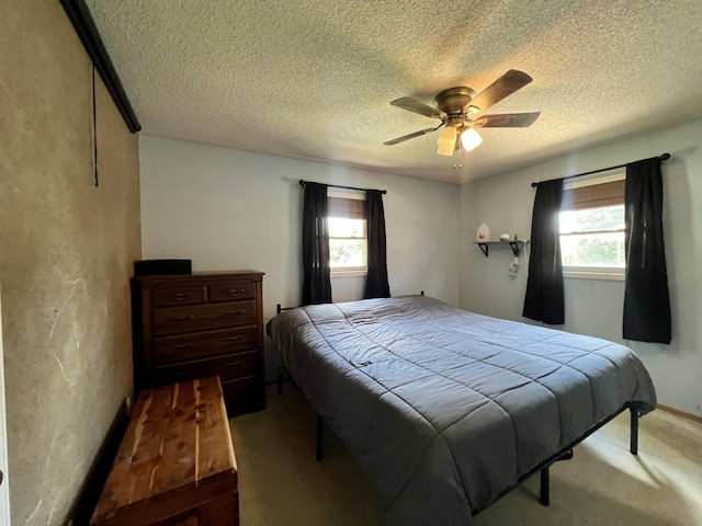817 Fillmore St, Mount Vernon, MO 65712 - bedroom with a textured ceiling, carpet, and ceiling fan