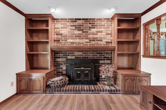 1011 W Tracy St, Springfield, MO 65807 - unfurnished living room with light wood finished floors and a fireplace