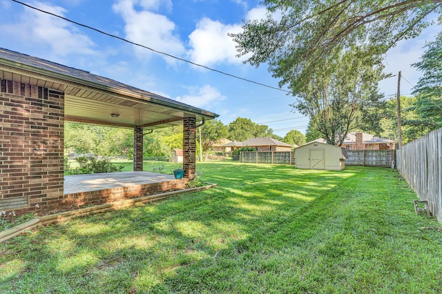 1011 W Tracy St, Springfield, MO 65807 - fenced backyard with a storage unit
