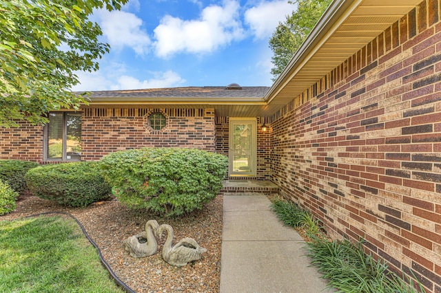 1011 W Tracy St, Springfield, MO 65807 - doorway to property with brick siding and roof with shingles