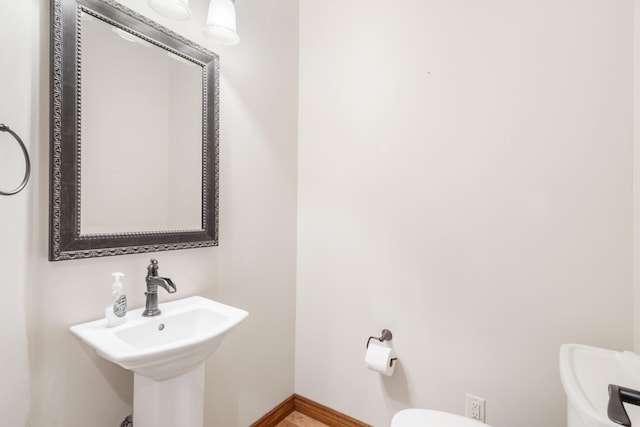 744 Seven Pines Dr, Saddlebrooke, MO 65630 - bathroom with toilet and baseboards
