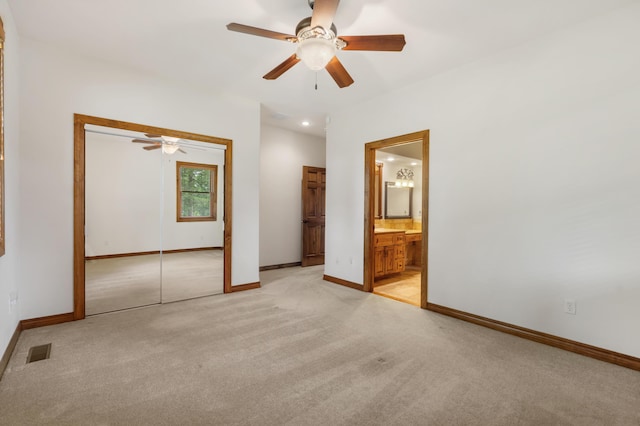 744 Seven Pines Dr, Saddlebrooke, MO 65630 - unfurnished bedroom with light carpet, a closet, a ceiling fan, and ensuite bathroom