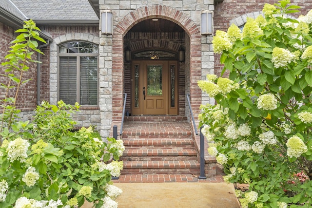 744 Seven Pines Dr, Saddlebrooke, MO 65630 - entrance to property with brick siding