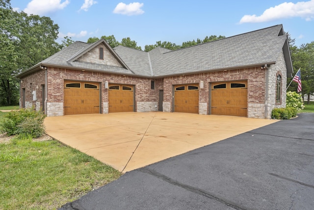 744 Seven Pines Dr, Saddlebrooke, MO 65630 - view of front facade featuring stone siding, concrete driveway, and a shingled roof