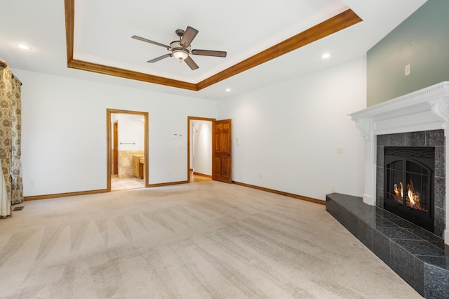 744 Seven Pines Dr, Saddlebrooke, MO 65630 - unfurnished living room featuring a tray ceiling, ceiling fan, light carpet, a tile fireplace, and recessed lighting