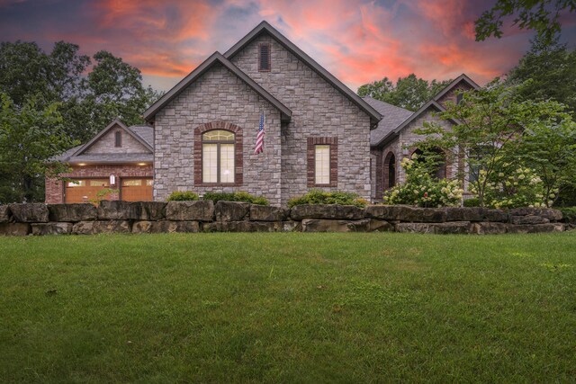 744 Seven Pines Dr, Saddlebrooke, MO 65630 - view of front of property featuring stone siding and a lawn