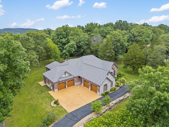 744 Seven Pines Dr, Saddlebrooke, MO 65630 - view from above of property with a forest