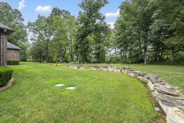 744 Seven Pines Dr, Saddlebrooke, MO 65630 - view of grassy yard