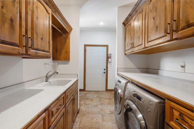 744 Seven Pines Dr, Saddlebrooke, MO 65630 - washroom featuring washing machine and clothes dryer, cabinet space, recessed lighting, and light stone finish flooring