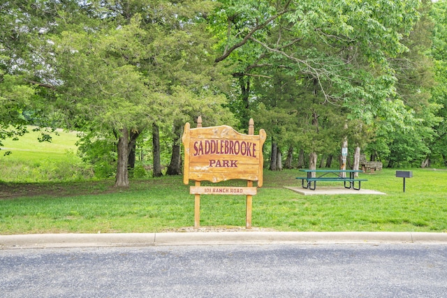 744 Seven Pines Dr, Saddlebrooke, MO 65630 - community / neighborhood sign with a yard