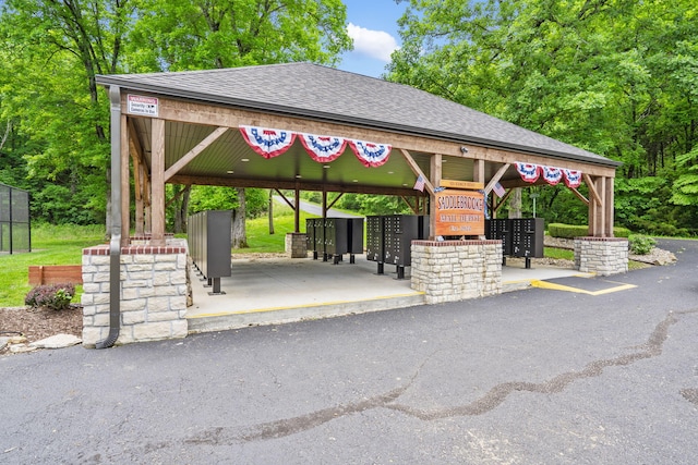 744 Seven Pines Dr, Saddlebrooke, MO 65630 - view of home's community with mail area and a carport