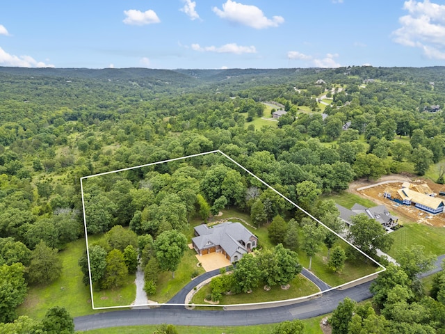 744 Seven Pines Dr, Saddlebrooke, MO 65630 - view of property location with a forest and property boundaries highlighted
