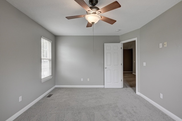4406 W 28th St, Joplin, MO 64804 - empty room with carpet, a ceiling fan, and a smoke detector