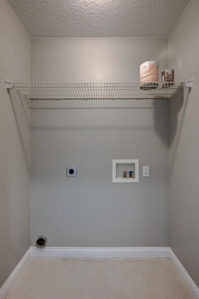 4406 W 28th St, Joplin, MO 64804 - laundry room with hookup for an electric dryer, carpet flooring, washer hookup, and a textured ceiling