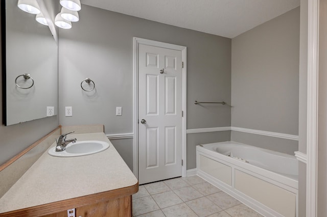 4406 W 28th St, Joplin, MO 64804 - bathroom with a bath, vanity, and tile patterned floors