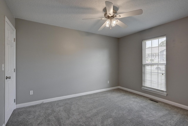 4406 W 28th St, Joplin, MO 64804 - carpeted spare room with a textured ceiling and ceiling fan