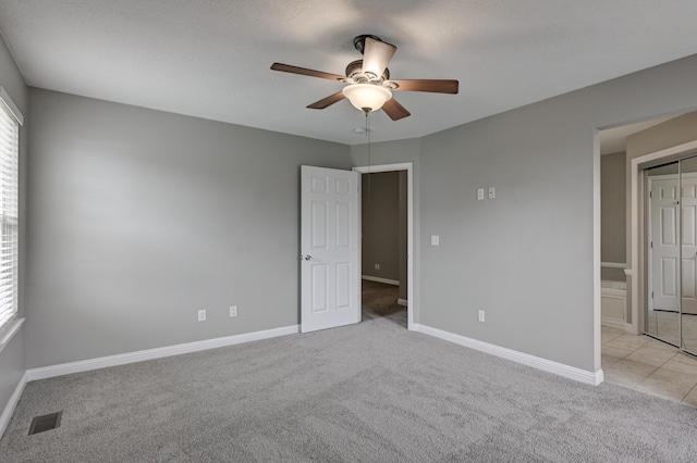 4406 W 28th St, Joplin, MO 64804 - unfurnished bedroom featuring light colored carpet and a ceiling fan