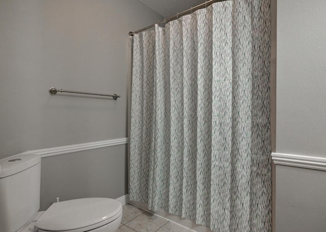 4406 W 28th St, Joplin, MO 64804 - bathroom featuring tile patterned floors and a shower with curtain