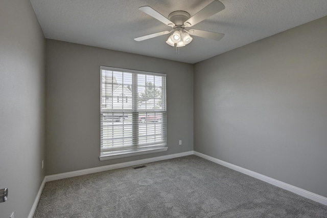4406 W 28th St, Joplin, MO 64804 - spare room featuring carpet, a ceiling fan, and a textured ceiling