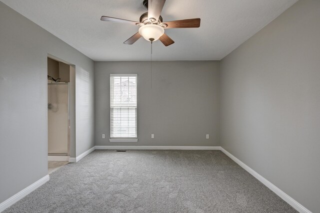 4406 W 28th St, Joplin, MO 64804 - unfurnished bedroom with light colored carpet and ceiling fan