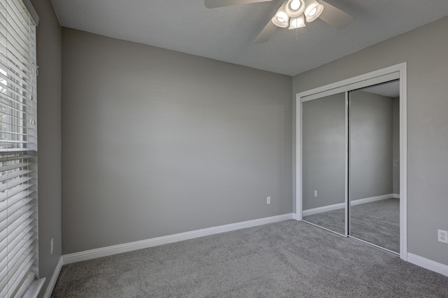 4406 W 28th St, Joplin, MO 64804 - unfurnished bedroom featuring carpet, a closet, and a ceiling fan
