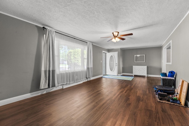 522 S Belcrest Ave, Springfield, MO 65802 - unfurnished living room with ceiling fan, wood finished floors, and a textured ceiling