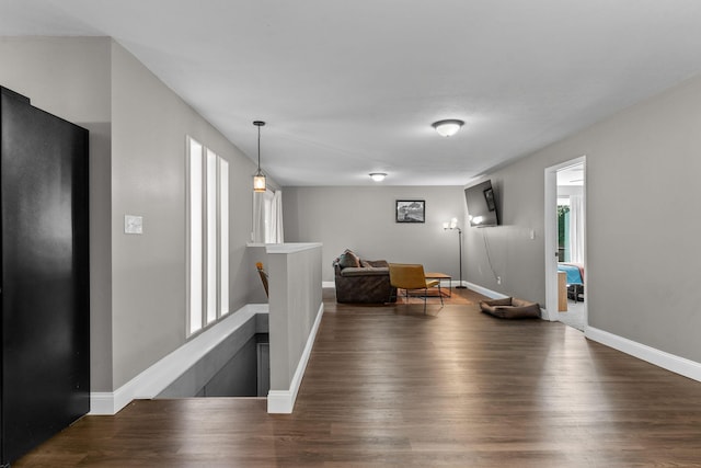 522 S Belcrest Ave, Springfield, MO 65802 - sitting room with wood finished floors and baseboards