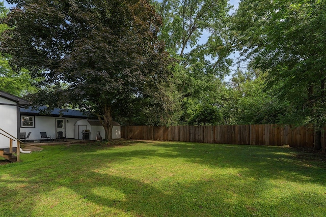 522 S Belcrest Ave, Springfield, MO 65802 - fenced backyard featuring a shed