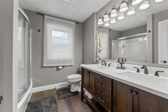 522 S Belcrest Ave, Springfield, MO 65802 - full bath featuring an enclosed shower, wood finished floors, and double vanity