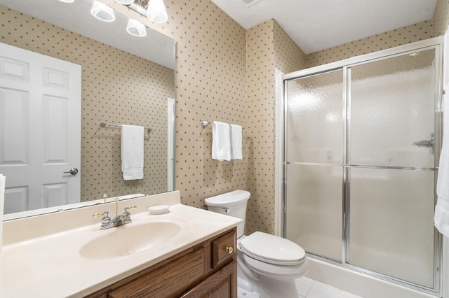 3314 Winged Foot Dr, Nixa, MO 65714 - bathroom with a stall shower, vanity, and tile patterned floors