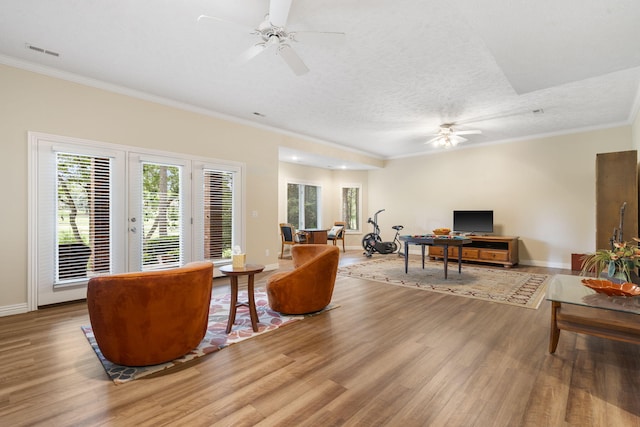 3314 Winged Foot Dr, Nixa, MO 65714 - living room with wood finished floors, a ceiling fan, crown molding, and recessed lighting