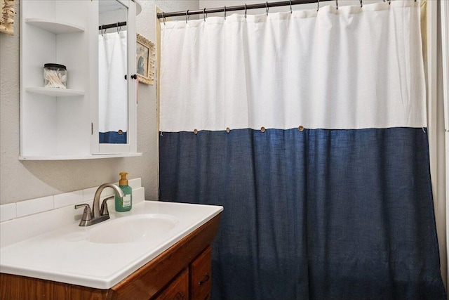 1188 Emerald Rd, Spokane, MO 65754 - bathroom with vanity and a textured wall