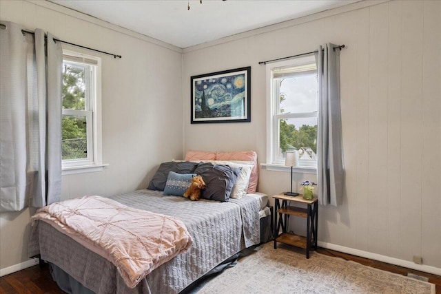 1188 Emerald Rd, Spokane, MO 65754 - bedroom featuring wood finished floors and wooden walls