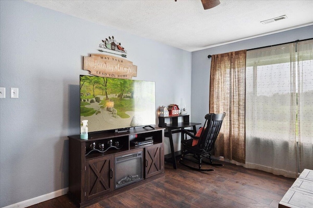 1188 Emerald Rd, Spokane, MO 65754 - office space featuring dark wood-style floors and a ceiling fan