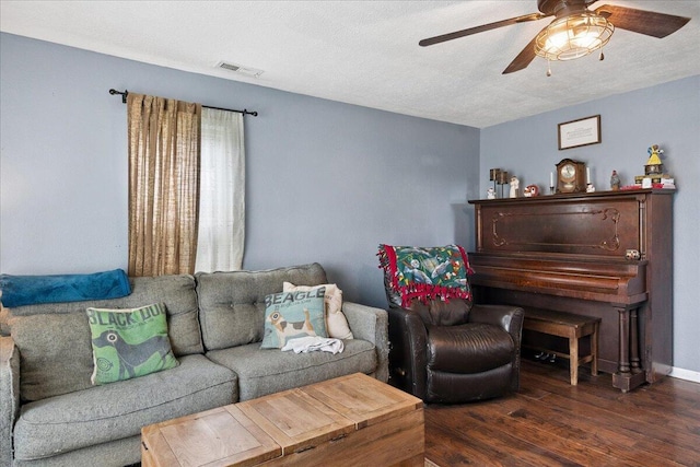 1188 Emerald Rd, Spokane, MO 65754 - living room with wood finished floors, a ceiling fan, and a textured ceiling