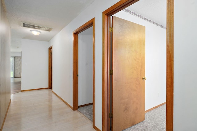 2816 N Pierce Ave, Springfield, MO 65803 - hall with light wood finished floors and baseboards