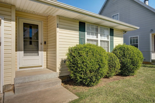 2816 N Pierce Ave, Springfield, MO 65803 - doorway to property featuring a lawn