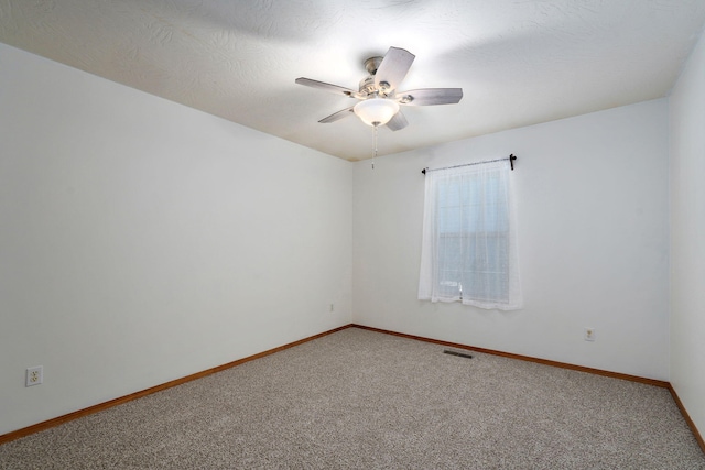 2816 N Pierce Ave, Springfield, MO 65803 - carpeted empty room with ceiling fan and baseboards
