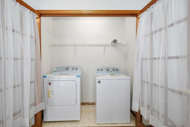 2816 N Pierce Ave, Springfield, MO 65803 - laundry area featuring washer and dryer and light floors