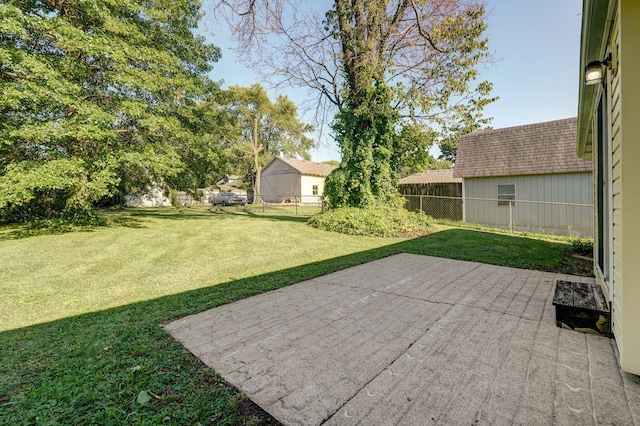 2816 N Pierce Ave, Springfield, MO 65803 - fenced backyard featuring a patio