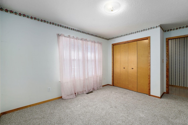 2816 N Pierce Ave, Springfield, MO 65803 - unfurnished bedroom with carpet floors and a closet