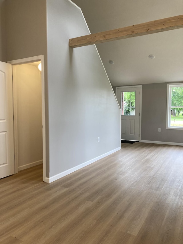 507 W Clouse St, Mountain Grove, MO 65711 - unfurnished living room featuring wood finished floors and plenty of natural light