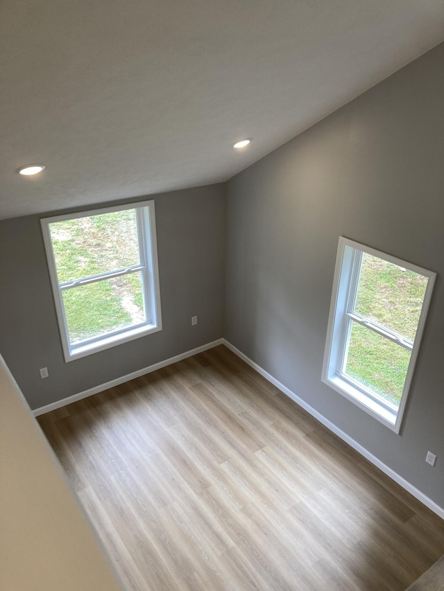 507 W Clouse St, Mountain Grove, MO 65711 - spare room with wood finished floors and recessed lighting