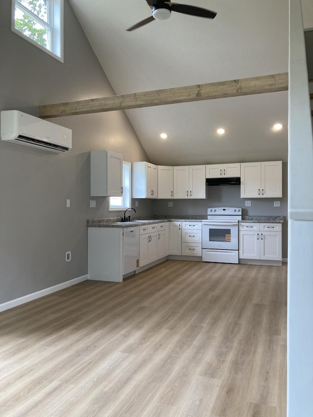 507 W Clouse St, Mountain Grove, MO 65711 - kitchen featuring white appliances, a wall mounted air conditioner, high vaulted ceiling, a ceiling fan, and white cabinetry