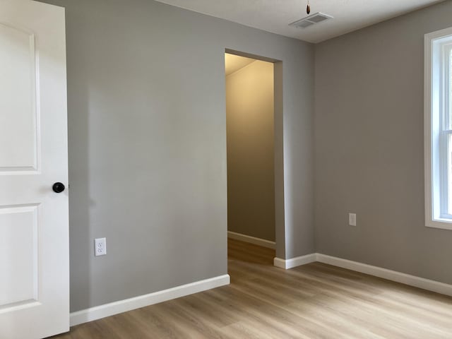 507 W Clouse St, Mountain Grove, MO 65711 - empty room with light wood finished floors and baseboards