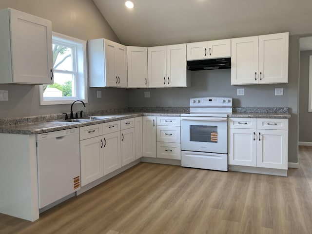 507 W Clouse St, Mountain Grove, MO 65711 - kitchen featuring white appliances, under cabinet range hood, light wood finished floors, vaulted ceiling, and white cabinetry